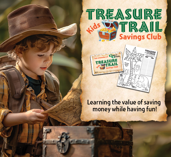 Young boy with treasure map and treasure box. CRCFCU Treasure Trail Kids Savings Club