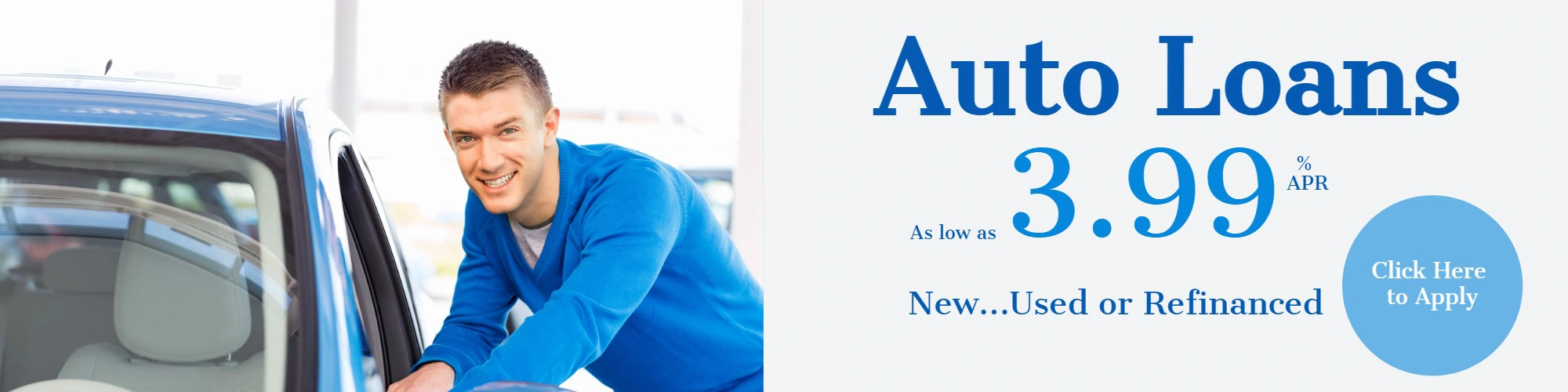 young guy leaning on new blue car. Auto Loans 3.99%