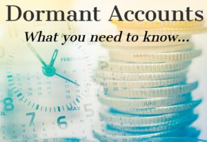 coins stacked and clock in background title dormant accounts