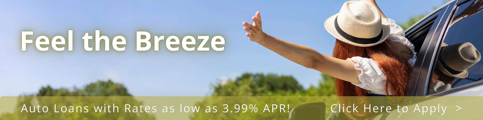 woman wearing hat, leaning out of car window. Auto loan rates from CrossRoads Community FCU