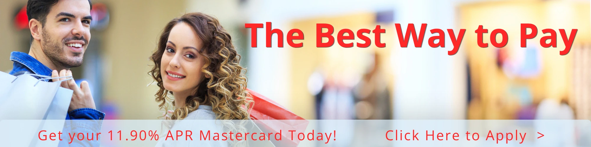 young couple looking back smiling while shopping with their CrossRoads Community fcu MasterCard low rate