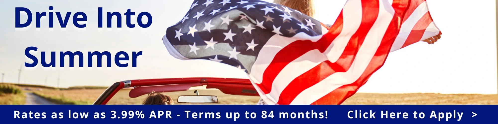 red convertible with woman holding flag. Drive into summer with 3.99% auto loans