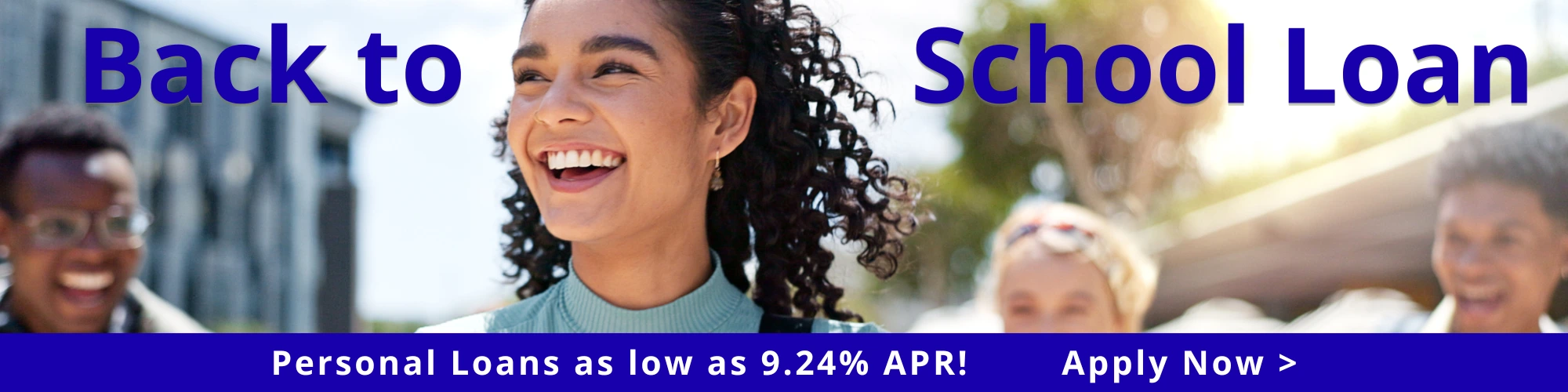 close up of young woman smiling and other students in background title back to school loan